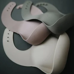 Mushie Silicone Baby Bib in Blush by